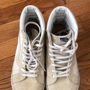 Cream colored high top old school vans